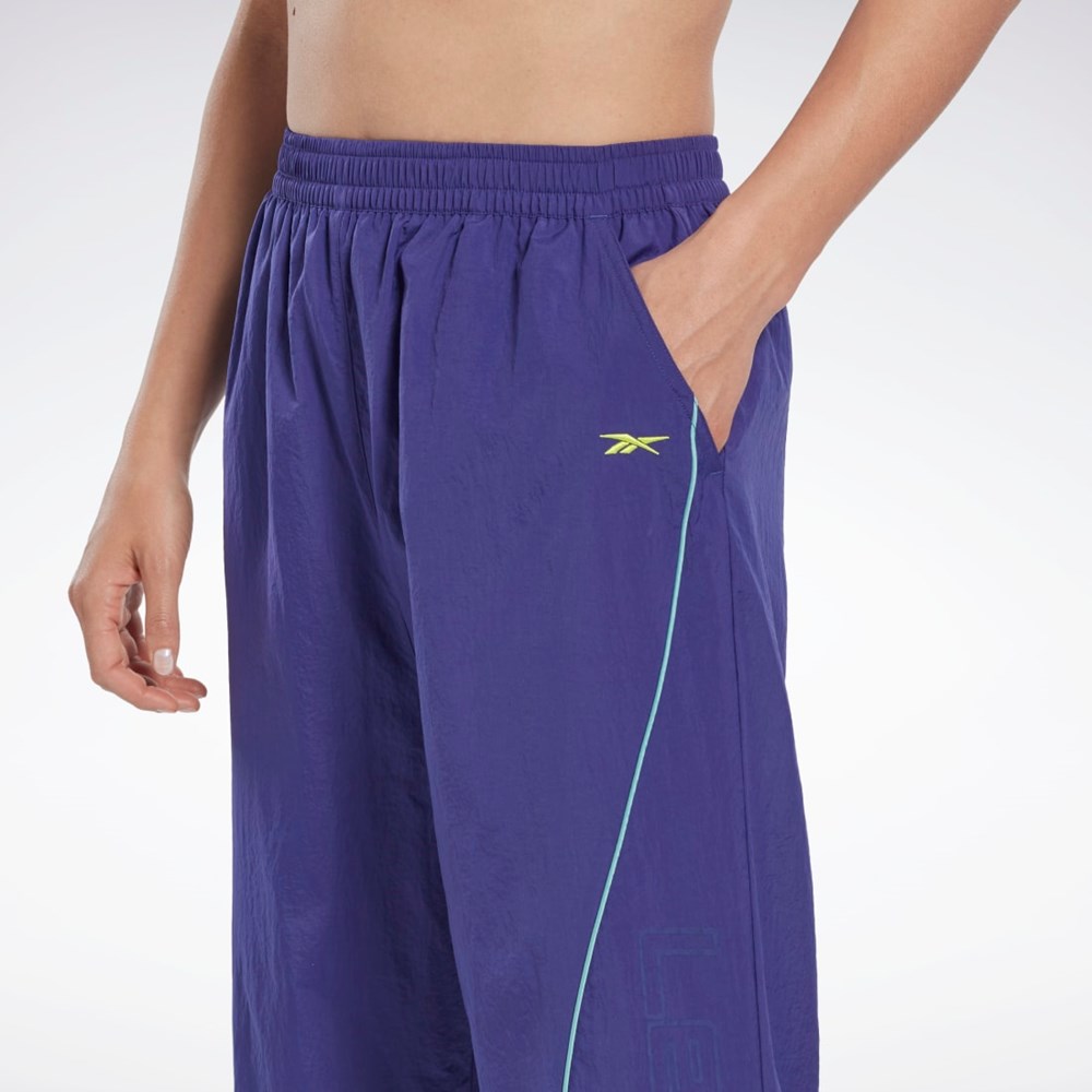 Bold Purple Reebok Les Mills® Woven Pants | HN6050